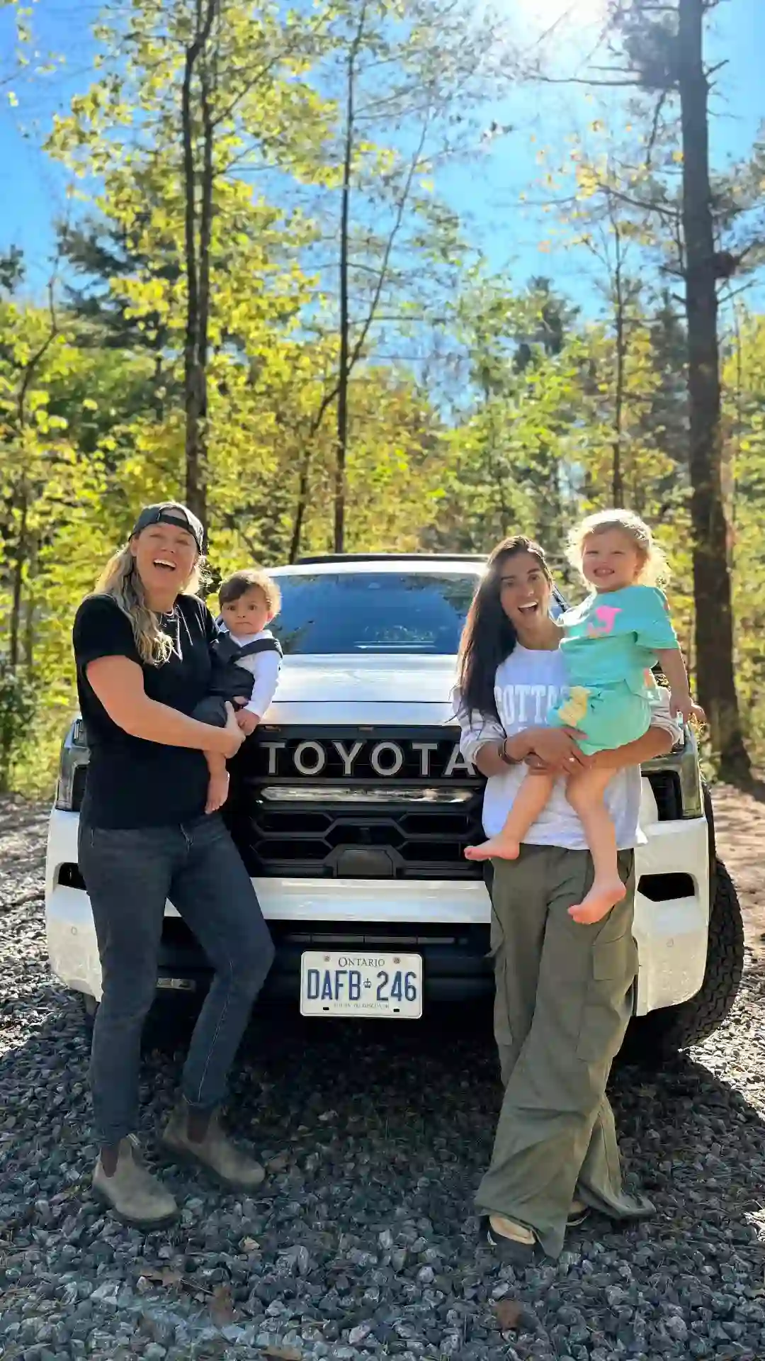 Our family loaded up beside the truck before a road trip