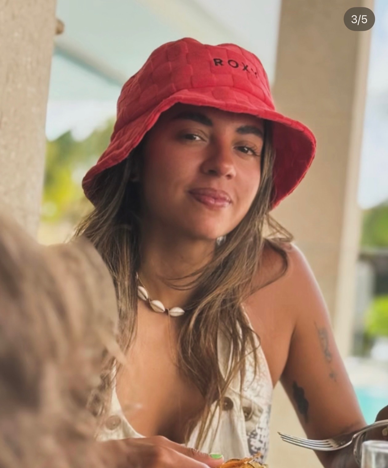 Ale in a red bucket hat